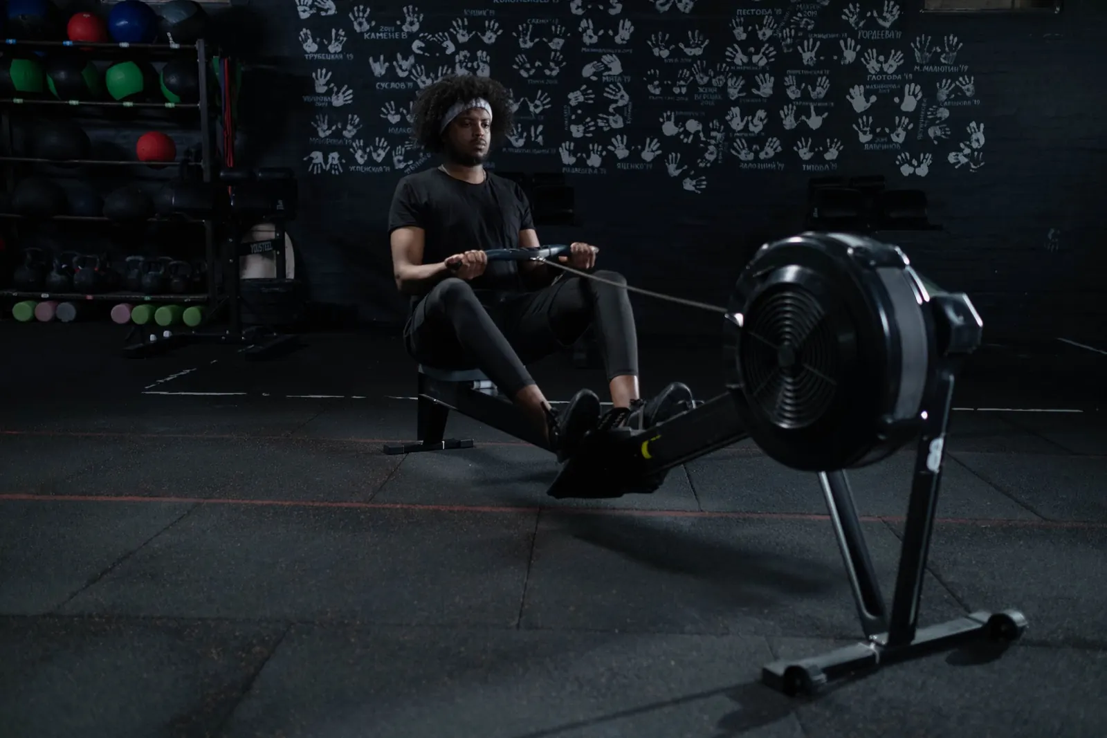 A man training on a rowing machine